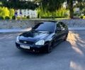 Черный ВАЗ Priora, объемом двигателя 1.6 л и пробегом 370 тыс. км за 2000 $, фото 1 на Automoto.ua