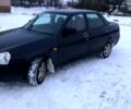 Черный ВАЗ Priora, объемом двигателя 1.6 л и пробегом 174 тыс. км за 2000 $, фото 1 на Automoto.ua