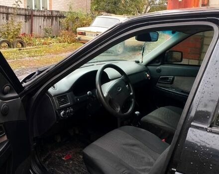 Черный ВАЗ Priora, объемом двигателя 1.6 л и пробегом 330 тыс. км за 2400 $, фото 2 на Automoto.ua