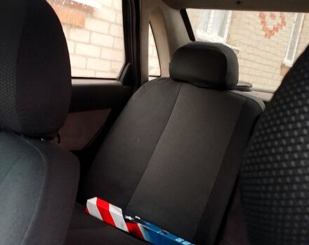 Черный ВАЗ Priora, объемом двигателя 1.6 л и пробегом 330 тыс. км за 2400 $, фото 1 на Automoto.ua