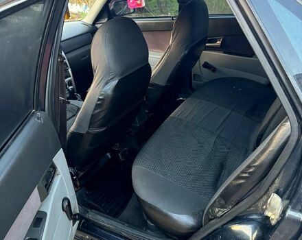 Черный ВАЗ Priora, объемом двигателя 1.6 л и пробегом 200 тыс. км за 2600 $, фото 10 на Automoto.ua