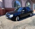 Чорний ВАЗ Priora, об'ємом двигуна 1.6 л та пробігом 128 тис. км за 1799 $, фото 1 на Automoto.ua