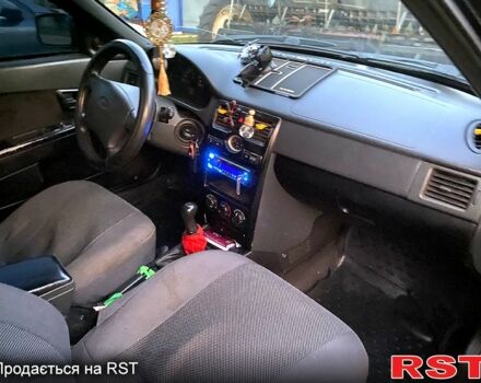 Черный ВАЗ Priora, объемом двигателя 1.6 л и пробегом 264 тыс. км за 2500 $, фото 4 на Automoto.ua