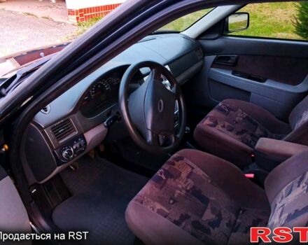 Черный ВАЗ Priora, объемом двигателя 1.6 л и пробегом 185 тыс. км за 2400 $, фото 5 на Automoto.ua