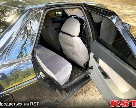 Черный ВАЗ Priora, объемом двигателя 1.6 л и пробегом 185 тыс. км за 2200 $, фото 7 на Automoto.ua