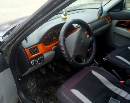 Чорний ВАЗ Priora, об'ємом двигуна 1.6 л та пробігом 157 тис. км за 1650 $, фото 7 на Automoto.ua