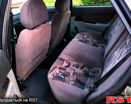 Черный ВАЗ Priora, объемом двигателя 1.6 л и пробегом 185 тыс. км за 2400 $, фото 6 на Automoto.ua