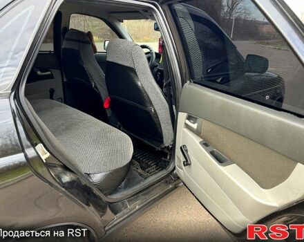 Черный ВАЗ Priora, объемом двигателя 1.6 л и пробегом 105 тыс. км за 4000 $, фото 12 на Automoto.ua