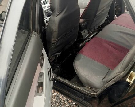 Черный ВАЗ Priora, объемом двигателя 1.6 л и пробегом 161 тыс. км за 2000 $, фото 6 на Automoto.ua