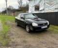 Черный ВАЗ Priora, объемом двигателя 1.6 л и пробегом 240 тыс. км за 1750 $, фото 1 на Automoto.ua