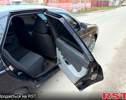 Черный ВАЗ Priora, объемом двигателя 1.6 л и пробегом 185 тыс. км за 2250 $, фото 10 на Automoto.ua