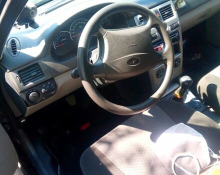 Чорний ВАЗ Priora, об'ємом двигуна 1.6 л та пробігом 236 тис. км за 1850 $, фото 6 на Automoto.ua