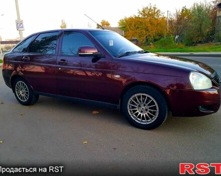 Красный ВАЗ Priora, объемом двигателя 1.6 л и пробегом 118 тыс. км за 3900 $, фото 3 на Automoto.ua