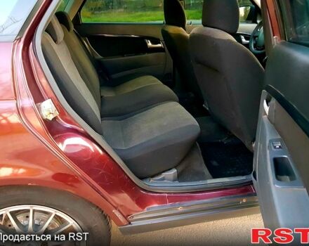 Красный ВАЗ Priora, объемом двигателя 1.6 л и пробегом 118 тыс. км за 3900 $, фото 10 на Automoto.ua