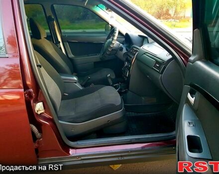 Красный ВАЗ Priora, объемом двигателя 1.6 л и пробегом 118 тыс. км за 3900 $, фото 8 на Automoto.ua