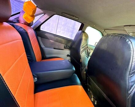 Красный ВАЗ Priora, объемом двигателя 1.6 л и пробегом 210 тыс. км за 1900 $, фото 4 на Automoto.ua