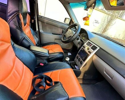 Красный ВАЗ Priora, объемом двигателя 1.6 л и пробегом 210 тыс. км за 1900 $, фото 3 на Automoto.ua
