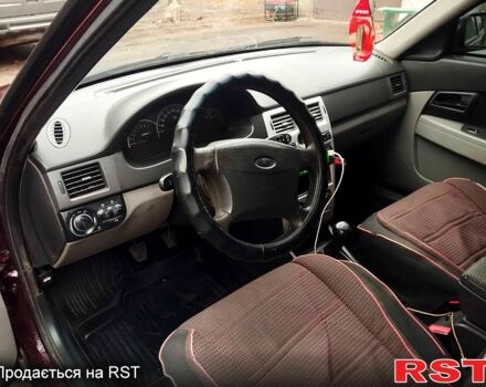 Красный ВАЗ Priora, объемом двигателя 1.6 л и пробегом 60 тыс. км за 3100 $, фото 4 на Automoto.ua