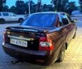Красный ВАЗ Priora, объемом двигателя 1.6 л и пробегом 300 тыс. км за 1349 $, фото 1 на Automoto.ua