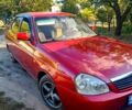 Красный ВАЗ Priora, объемом двигателя 1.6 л и пробегом 150 тыс. км за 2700 $, фото 1 на Automoto.ua