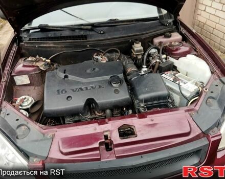 Красный ВАЗ Priora, объемом двигателя 1.6 л и пробегом 60 тыс. км за 3100 $, фото 7 на Automoto.ua