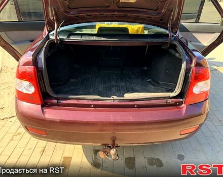 Красный ВАЗ Priora, объемом двигателя 1.6 л и пробегом 222 тыс. км за 2650 $, фото 4 на Automoto.ua