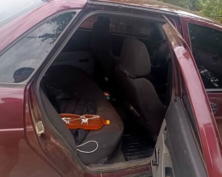 Красный ВАЗ Priora, объемом двигателя 1.6 л и пробегом 200 тыс. км за 2500 $, фото 3 на Automoto.ua