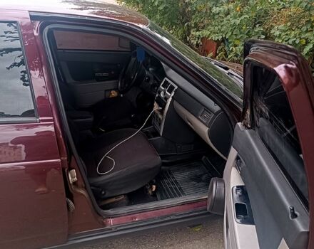 Красный ВАЗ Priora, объемом двигателя 1.6 л и пробегом 200 тыс. км за 2500 $, фото 4 на Automoto.ua