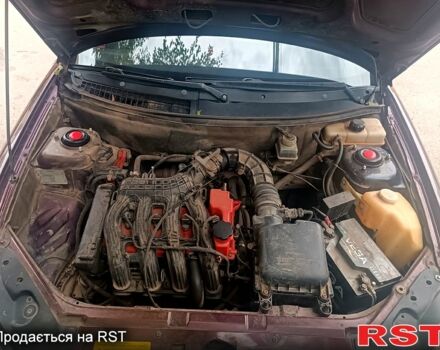 Красный ВАЗ Priora, объемом двигателя 1.6 л и пробегом 200 тыс. км за 2500 $, фото 1 на Automoto.ua