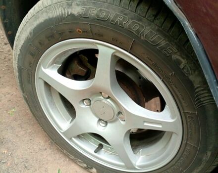 Червоний ВАЗ Priora, об'ємом двигуна 1.6 л та пробігом 142 тис. км за 3010 $, фото 5 на Automoto.ua