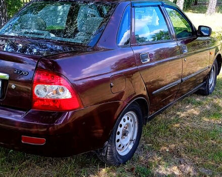 Красный ВАЗ Priora, объемом двигателя 1.6 л и пробегом 238 тыс. км за 1550 $, фото 2 на Automoto.ua