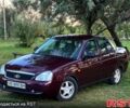 Красный ВАЗ Priora, объемом двигателя 1.6 л и пробегом 205 тыс. км за 3100 $, фото 1 на Automoto.ua