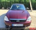 Красный ВАЗ Priora, объемом двигателя 1.6 л и пробегом 222 тыс. км за 2650 $, фото 1 на Automoto.ua
