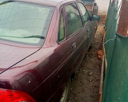 Красный ВАЗ Priora, объемом двигателя 1.6 л и пробегом 190 тыс. км за 4000 $, фото 2 на Automoto.ua