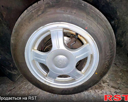 Красный ВАЗ Priora, объемом двигателя 1.6 л и пробегом 250 тыс. км за 3200 $, фото 11 на Automoto.ua