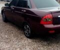 Красный ВАЗ Priora, объемом двигателя 1.6 л и пробегом 198 тыс. км за 3600 $, фото 1 на Automoto.ua