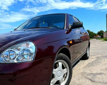 Красный ВАЗ Priora, объемом двигателя 1.6 л и пробегом 150 тыс. км за 3200 $, фото 1 на Automoto.ua
