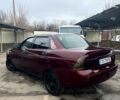 Красный ВАЗ Priora, объемом двигателя 1.6 л и пробегом 250 тыс. км за 1950 $, фото 2 на Automoto.ua