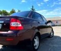 Красный ВАЗ Priora, объемом двигателя 1.6 л и пробегом 150 тыс. км за 3200 $, фото 2 на Automoto.ua