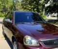 Красный ВАЗ Priora, объемом двигателя 1.6 л и пробегом 176 тыс. км за 3500 $, фото 1 на Automoto.ua