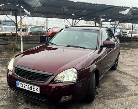 Красный ВАЗ Priora, объемом двигателя 1.6 л и пробегом 250 тыс. км за 1950 $, фото 1 на Automoto.ua