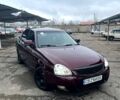 Красный ВАЗ Priora, объемом двигателя 1.6 л и пробегом 250 тыс. км за 1950 $, фото 1 на Automoto.ua