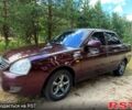 Красный ВАЗ Priora, объемом двигателя 1.6 л и пробегом 175 тыс. км за 2350 $, фото 1 на Automoto.ua