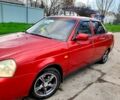 Красный ВАЗ Priora, объемом двигателя 1.6 л и пробегом 148 тыс. км за 2900 $, фото 1 на Automoto.ua