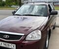 Красный ВАЗ Priora, объемом двигателя 1.6 л и пробегом 106 тыс. км за 3100 $, фото 1 на Automoto.ua