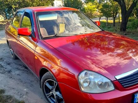 Красный ВАЗ Priora, объемом двигателя 1.6 л и пробегом 150 тыс. км за 2700 $, фото 1 на Automoto.ua