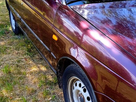 Красный ВАЗ Priora, объемом двигателя 1.6 л и пробегом 238 тыс. км за 1550 $, фото 1 на Automoto.ua