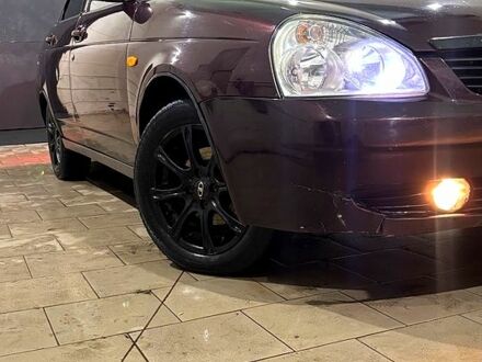 Красный ВАЗ Priora, объемом двигателя 1.6 л и пробегом 187 тыс. км за 3000 $, фото 1 на Automoto.ua