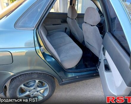 Зеленый ВАЗ Priora, объемом двигателя 1.6 л и пробегом 177 тыс. км за 2400 $, фото 7 на Automoto.ua