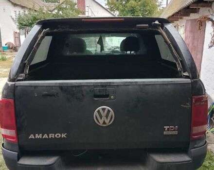 Черный Фольксваген Амарок, объемом двигателя 2 л и пробегом 350 тыс. км за 8000 $, фото 1 на Automoto.ua